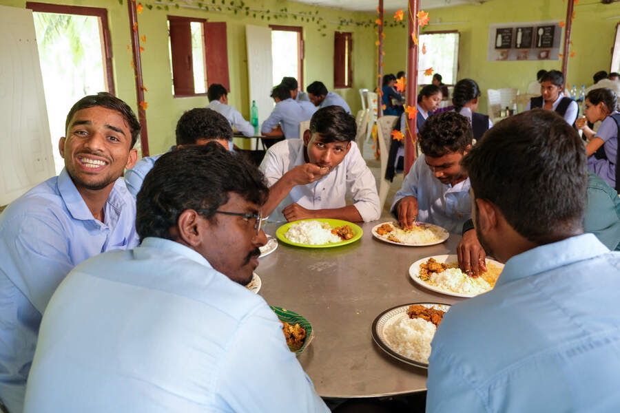 Students sharing a meal in the dining hall